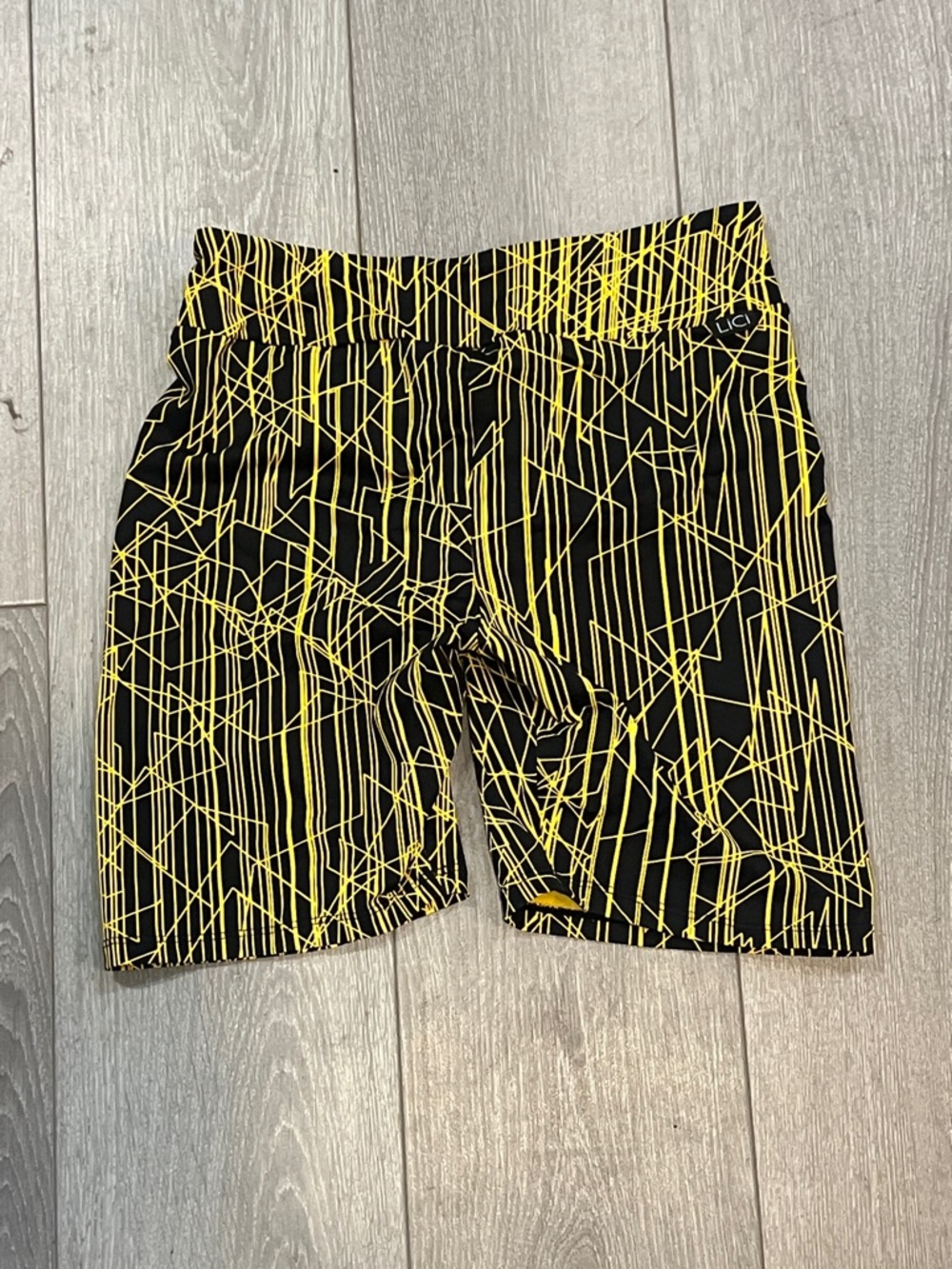 Black Athletic Shorts with Yellow Geometric Print
